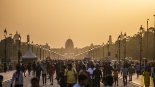 People visit the Kartavya Path in the early evening in New Delhi, India, on Tuesday, April 18, 2023. India has overtaken China as the world’s most populous nation, according to UN data released on April 19. Photographer: Prashanth Vishwanathan/Bloomberg via Getty Images