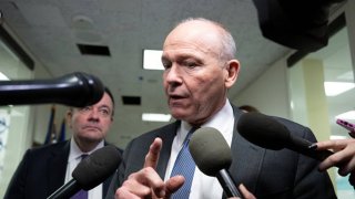 Boeing CEO Dave Calhoun speaks with reporters on Capitol Hill in Washington, D.C., before meeting with a group of senators on Jan. 24, 2024.