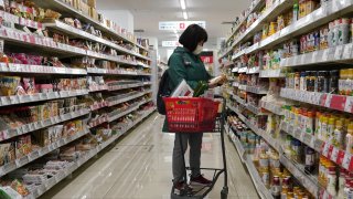 A customer shops at a supermarket in Tokyo on Feb. 27, 2024.