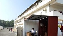 A uniformed security guard stationed at a Choice Canning shrimp processing plant in Amalapuram, India, in February.