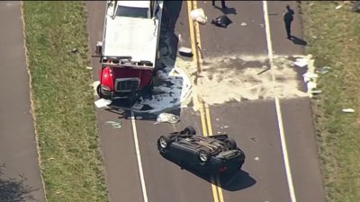 Officials investigate a deadly crash on the 202 Parkway involving a semi-truck