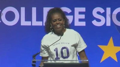 Michelle Obama surprises DC high school students celebrating College Signing Day