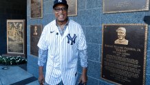 NEW YORK, NEW YORK - JULY 30: (NEW YORK DAILIES OUT)  Bernie Williams poses for a photograph next to his plaque in Monument Park during New York Yankees Old Timers' Day before a game against the Kansas City Royals at Yankee Stadium on Saturday, July 30, 2022  in New York City. The Yankees defeated the Royals 8-2. (Photo by Jim McIsaac/Getty Images)