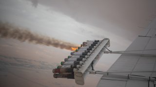 Hygroscopic (water-attracting) salt flares released below a cloud during a routine cloud-seeding mission on January 31, 2024 in Al Ain, United Arab Emirates. Cloud seeding is a weather modification technique that employs chemicals to stimulate the formation of ice crystals or raindrops within clouds. Although cloud seeding has been in use since 1947, its significance has grown, particularly for arid regions like the UAE. The country, with its own National Center of Meteorology and Seismology deploying planes for cloud seeding, has invested in the technology as an immediate solution to address challenges related to water scarcity.
 (Photo by Andrea DiCenzo/Getty Images)