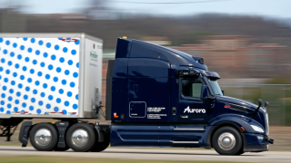 A self-driving tractor trailer maneuvers around a test track in Pittsburgh, Thursday, March 14, 2024. The truck is owned by Pittsburgh-based Aurora Innovation Inc.