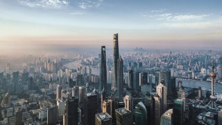 Drone point view of the Shanghai skyline at sunrise.