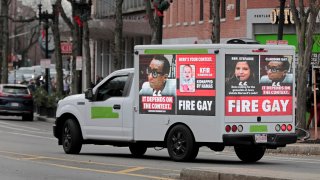 A truck with a “Fire Gay” message drives through Harvard Square. The congressional testimony of Harvard University president Claudine Gay has caused a stir on campus on Dec 10th. 2023.