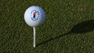 A detail photograph of a US Open Championship logo golf ball