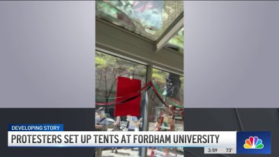 Protesters set up tents at Fordham University