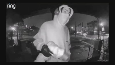 Video shows man walk up to ring doorbell with an apparent gun, police say