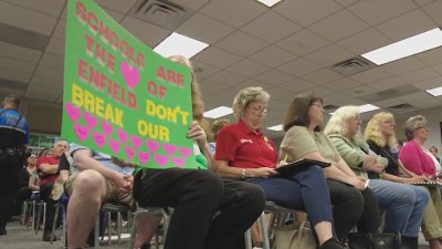 Teachers, community members rally to prevent job & program cuts at Enfield schools
