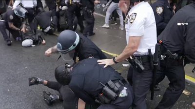 NYPD defends cops seen repeatedly punching protesters on the ground