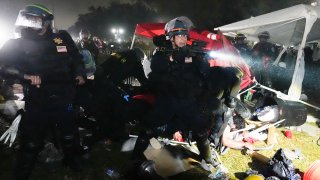 Police advance on pro-Palestinian demonstrators after defying orders to leave at an encampment on the UCLA campus, in Los Angeles, May 2, 2024. Colleges and universities have long been protected places for free expression without pressure or punishment. But protests over Israel's conduct of the war in Gaza in its hunt for Hamas after the Oct. 7 massacre has tested that ideal around the world.