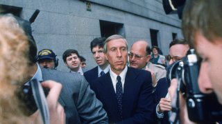Ivan F. Boesky, center, leaves federal court in New York, April 24, 1987 after pleading guilty to one count of violating federal securities laws. Boesky, the flamboyant stock speculator whose cooperation with the government cracked open one of the largest insider trading scandals on Wall Street, has died at the age of 87.