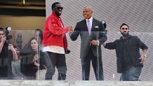 NEW YORK, NEW YORK - SEPTEMBER 15: New York Mayor Eric Adams (R) presents Sean "Diddy" Combs with the keys to the city in Times Square on September 15, 2023 in New York City. (Photo by Cindy Ord/Getty Images)