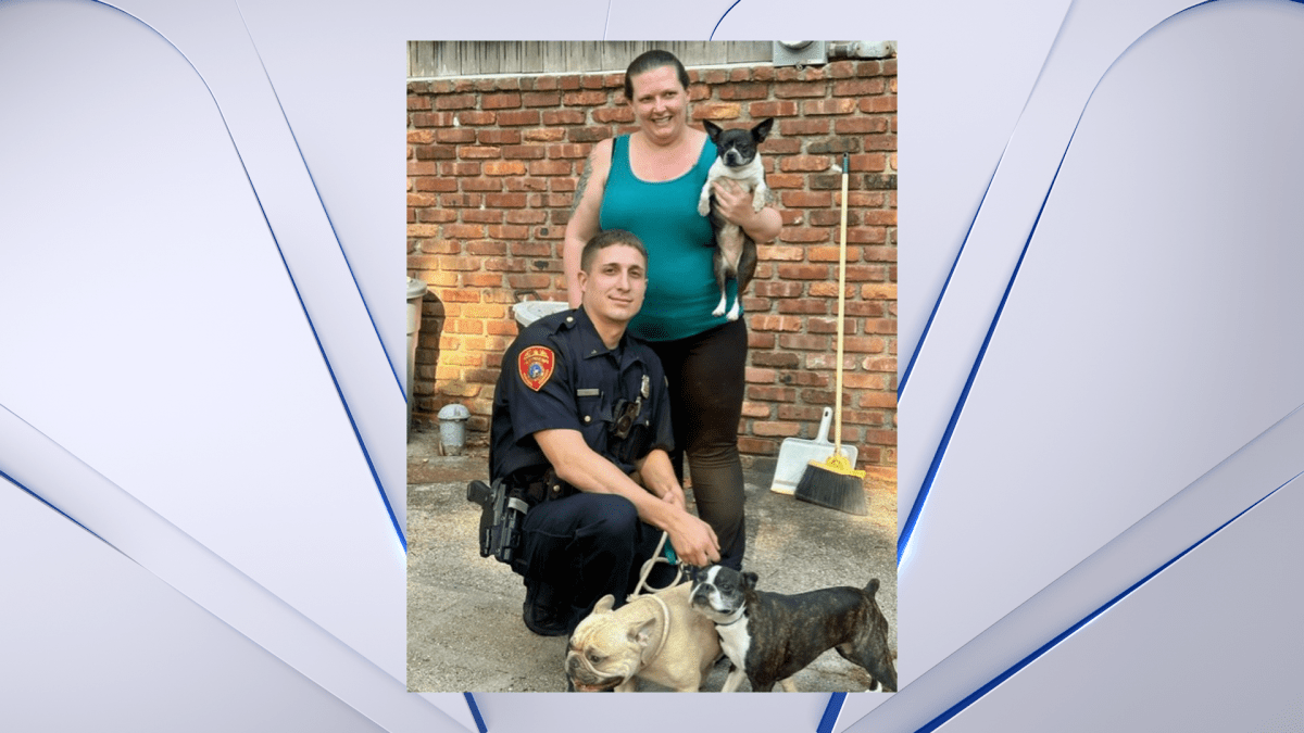 Long Island news Suffolk County police officer rescues 3 dogs from