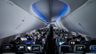 Passengers on a Boeing 737 Max-8 plane during a United Airlines flight departing from Newark Liberty International Airport (EWR) in Newark, New Jersey, US, on Wednesday, March 13, 2024.