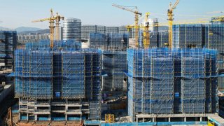 The aerial view shows residential buildings under construction in Hangzhou, China on March 15, 2024.