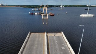 In an aerial view, the remains of the Francis Scott Key Bridge are seen as salvage crews continue to work to clean up the wreckage after the bridge collapsed in the Patapsco River on June 11, 2024 in Baltimore, Maryland.
