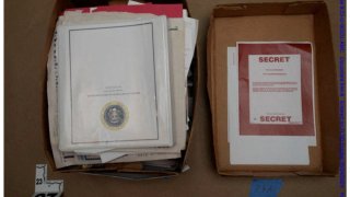 Documents and materials seized during a search of former U.S. President Donald Trump’s Mar-a-Lago home and social club, are pictured in this handout.