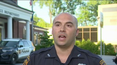 Officer rushes into NY home, helps rescue family from fire