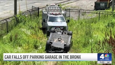 Car with no one inside falls off BJ's parking garage in the Bronx