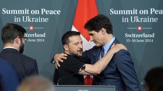 Ukraine's President Volodymyr Zelenskyy hugs Canada Prime Minister Justin Trudeau during the closing press conference of the Ukraine peace summit in Obbürgen, Switzerland, Sunday, June 16, 2024.