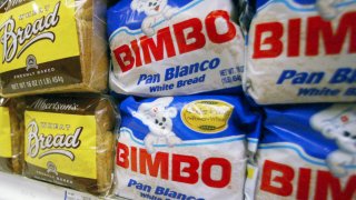 Bimbo bread is displayed on a shelf at a market