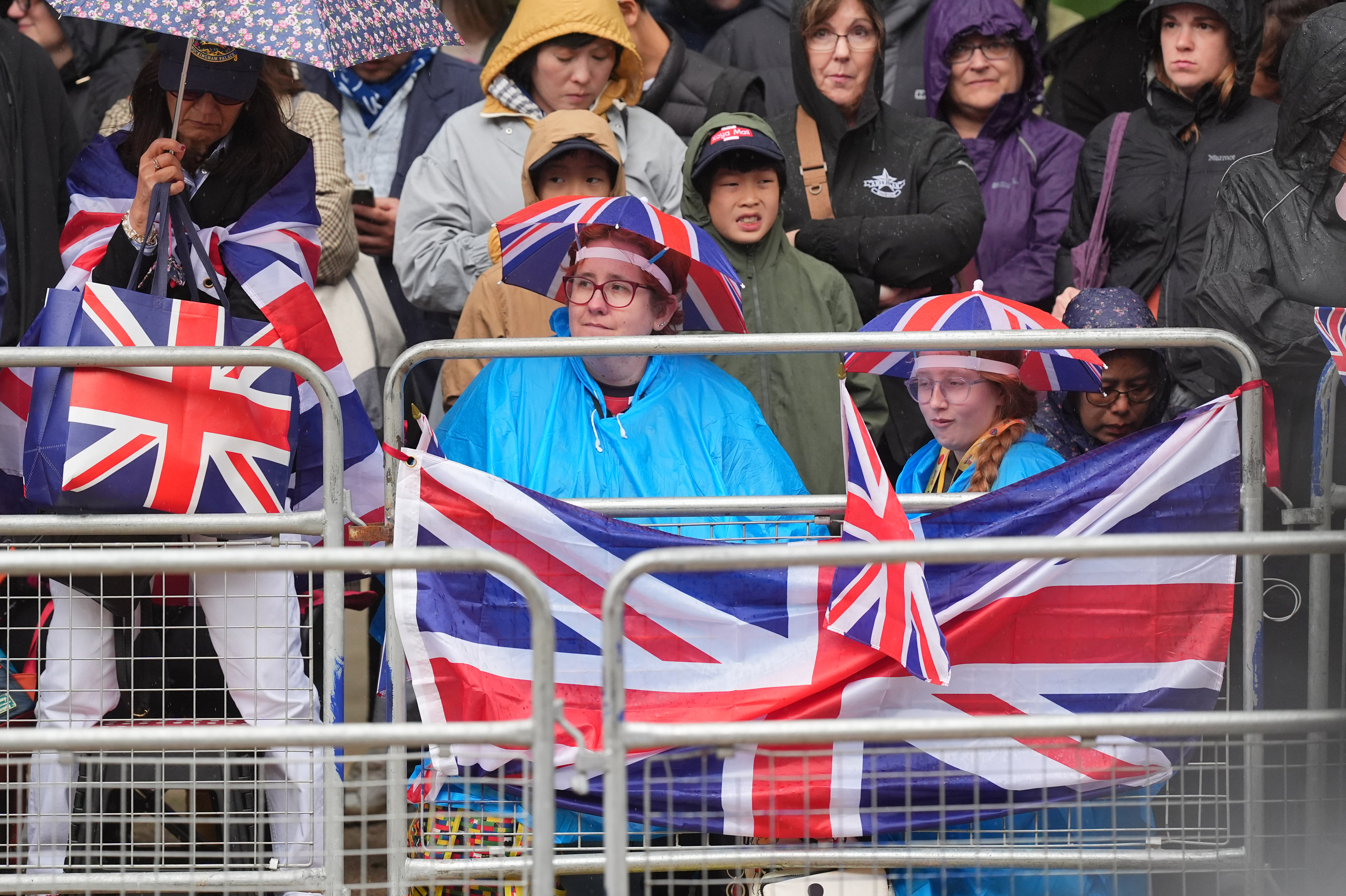 Royal fans on the The Mall ahead of the Trooping the Colour ceremony at Horse Guards Parade, central London, as King Charles III celebrates his official birthday. Picture date: Saturday June 15, 2024.