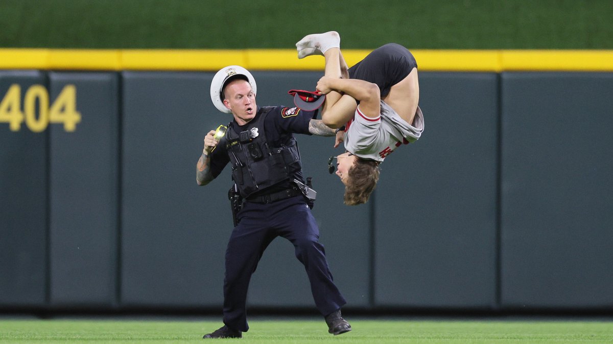 watch-reds-fan-gets-tased-after-running-onto-field-and-doing-backflip