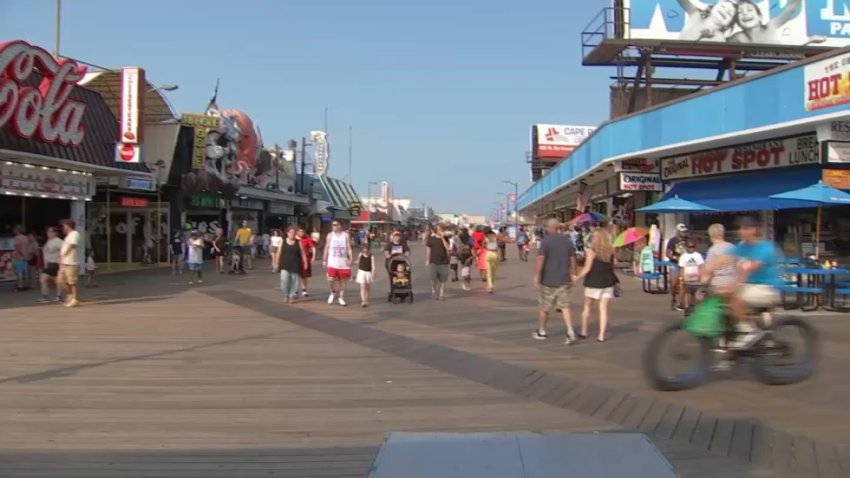 People walking on the Wildwood boardwalk at the Jersey Shore