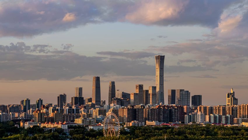 View of the central business district skyline at sunset in Beijing, China.