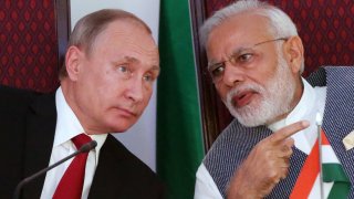 Russian President Vladimir Putin speaking to Indian Prime Minister Narendra Modi during their meeting at Taj Exotic Hotel on October, 15, 2016 in Benaulim, Goa, India.