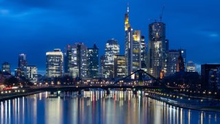 23 February 2024, Hesse, Frankfurt/Main: The lights of Frankfurt am Main’s banking skyline glow in the last light of day. Photo: Boris Roessler/dpa (Photo by Boris Roessler/picture alliance via Getty Images)