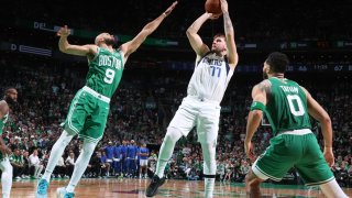 Luka Doncic, #77 of the NBA’s Dallas Mavericks, shoots the ball against the Boston Celtics during Game 5 of the 2024 NBA Finals at the TD Garden in Boston on June 17, 2024.