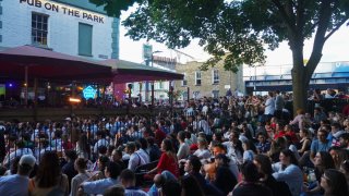 People watch England play Spain in the Euro Cup final shown at the Pub on the Park in London Fields on the 14th of July 2024, London, United Kingdom. 