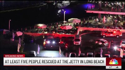 At least five people rescued at the jetty in Long Beach