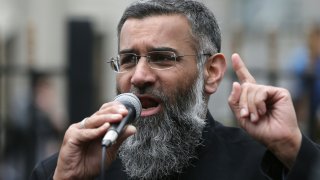 FILE – This is a Friday, April 3, 2015 file photo of Anjem Choudary, a British Muslim social and political activist and spokesman for Islamist group, Islam4UK, speaks following prayers at the Central London Mosque in Regent’s Park, London, April 3, 2015. Radical British preacher Anjem Choudary, who was previously convicted of supporting the so-called Islamic State, was found guilty Tuesday by an London jury on terrorism-related charges.