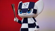 Miraitowa, the mascot for the Tokyo 2020 Olympic Games, holds an Olympic torch during a ceremony marking one year before the start of the games in Tokyo on July 24, 2019. - Tokyo entered the final leg of its marathon Olympic preparations, marking a year until the 2020 Games open with officials promising a high-tech but eco-friendly event. (Photo by Behrouz MEHRI / AFP) (Photo by BEHROUZ MEHRI/AFP via Getty Images)