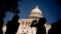 WASHINGTON, DC – JUNE 21: A young visitor to the U.S. Capitol Building takes a drink in the shade as much of the Northeast braces for a heat wave on June 21, 2024 in Washington, DC. Temperatures are forecasted to soar into the high 90s, with a heat index surpassing 100 degrees. (Photo by Andrew Harnik/Getty Images)