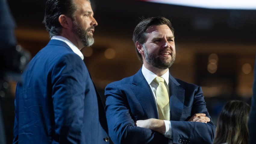 WASHINGTON – JULY 16: Sen. J.D. Vance, R-Ohio, right, the running mate of former President Donald Trump, Republican presidential nominee, and Donald Trump Jr., are seen on stage during a sound check in the Fiserv Forum before the second day’s session of Republican National Convention in Milwaukee, Wis., on Tuesday, July 16, 2024. (Tom Williams/CQ-Roll Call, Inc via Getty Images)