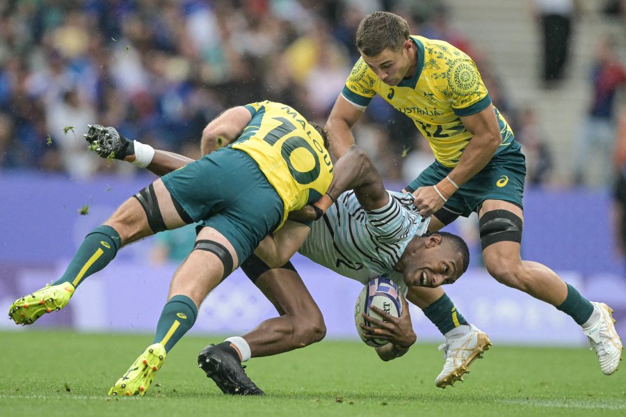 Tackle during men's semi-final rugby sevens match between Fiji and Australia