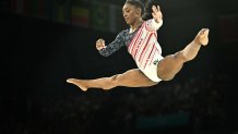 US' Simone Biles competes in the balance beam event of the artistic gymnastics women's team final during the Paris 2024 Olympic Games at the Bercy Arena in Paris, on July 30, 2024. (Photo by Lionel BONAVENTURE / AFP) (Photo by LIONEL BONAVENTURE/AFP via Getty Images)