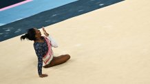 US' Simone Biles competes in the floor exercise event of the artistic gymnastics women's team final during the Paris 2024 Olympic Games at the Bercy Arena in Paris, on July 30, 2024. (Photo by Paul ELLIS / AFP) (Photo by PAUL ELLIS/AFP via Getty Images)