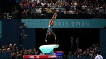 Simone Biles competes on the vault