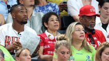 PARIS, FRANCE - JULY 30: Family members of Simone Biles of Team United States, (L-R) her husband Jonathan Owens and parents Nellie and Ronald Biles look on during the Artistic Gymnastics Women's Team Final on day four of the Olympic Games Paris 2024 at Bercy Arena on July 30, 2024 in Paris, France. (Photo by Pascal Le Segretain/Getty Images)