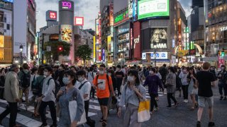 People walk through Shibuya on June 23, 2020 in Tokyo, Japan.