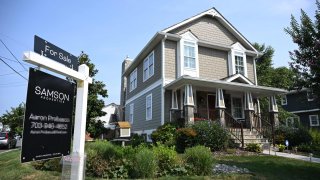 A “For Sale” sign in front of a home in Arlington, Virginia, on Aug. 22, 2023.