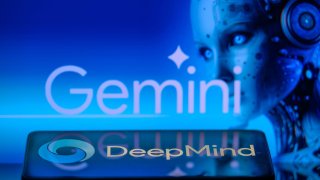 The Deepmind logo is being displayed on a smartphone with the Google Gemini logo in the background in this photo illustration in Brussels, Belgium, on February 8, 2024.