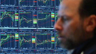 A trader works on the floor of the New York Stock Exchange (NYSE) during morning trading on March 4, 2024 in New York City.